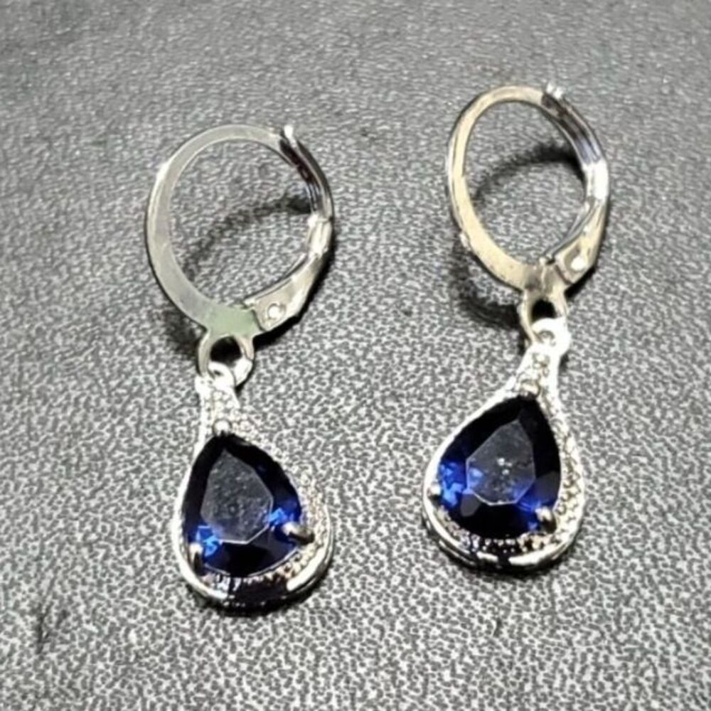 Silver tone blue rhinestone teardrop dangling earrings